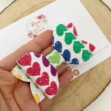 Load image into Gallery viewer, Bright Rainbow Heart Glitter Valentine’s Day Hair Bow Headband or Clip