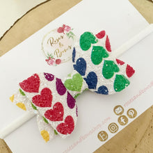 Load image into Gallery viewer, Bright Rainbow Heart Glitter Valentine’s Day Hair Bow Headband or Clip
