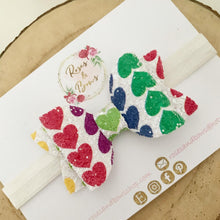 Load image into Gallery viewer, Bright Rainbow Heart Glitter Valentine’s Day Hair Bow Headband or Clip