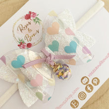 Load image into Gallery viewer, Rainbow Heart Charm Hair Bow Headband or clip