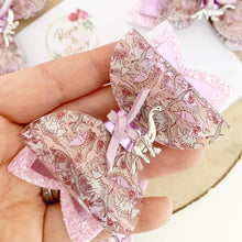 Load image into Gallery viewer, Dinosaurs transparent glitter charm Hair Bow Headband or Clip