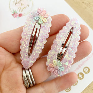 Pink rainbow daisy snap clips set