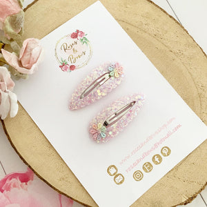 Pink rainbow daisy snap clips set