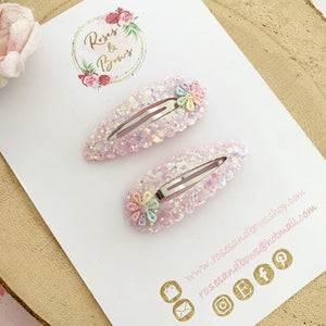 Pink rainbow daisy snap clips set