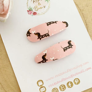 Pink sausage dog snap clips set