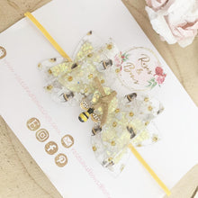 Load image into Gallery viewer, Bee Transparent and Glitter Hair Bow Headband or Clip
