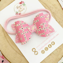 Load image into Gallery viewer, Pink Scrabble Leatherette and Glitter Bow Headband or Clip
