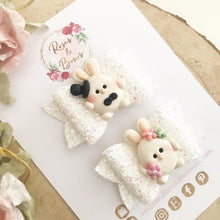 Load image into Gallery viewer, Mr and Mrs Bunny piggy bows - clip set - easter glitter bows
