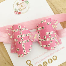 Load image into Gallery viewer, Pink Scrabble Leatherette and Glitter Bow Headband or Clip
