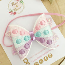 Load image into Gallery viewer, Rainbow Pop It  Embroidered Leatherette and Glitter Bow Headband or Clip
