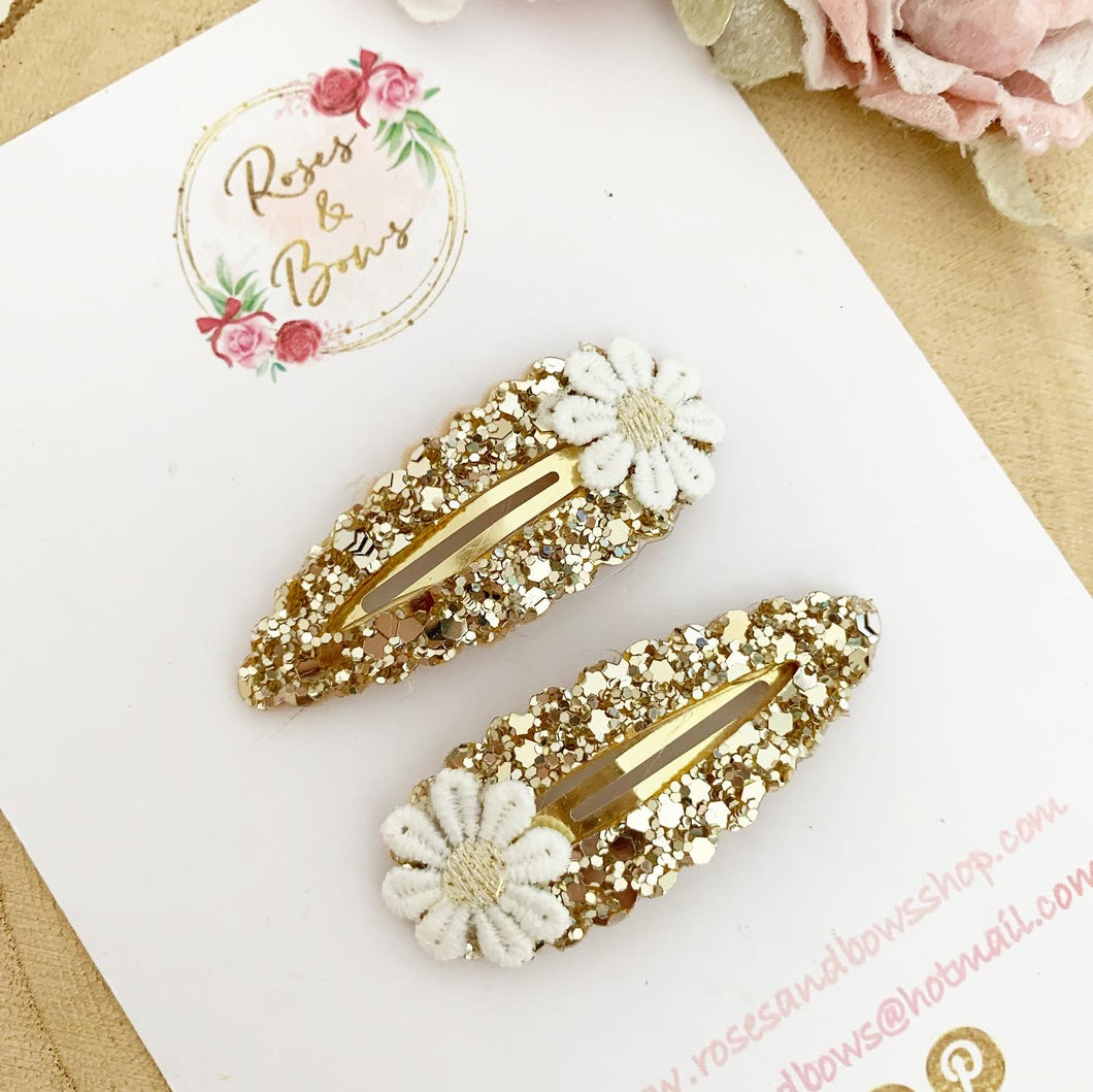 Gold daisy snap clips set