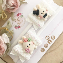 Load image into Gallery viewer, Mr and Mrs Bunny piggy bows - clip set - easter glitter bows
