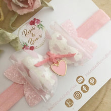 Load image into Gallery viewer, Pink Heart Transparent Valentine’s Bow with Charm
